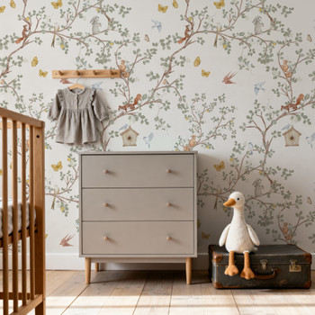 Soft green woodland nursery wallpaper with chinoiserie tree branches and small animals