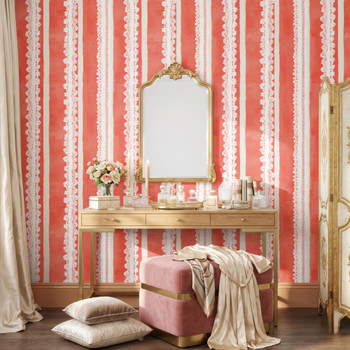 Pink coquette wallpaper in a baby girl nursery with crib and soft curtains