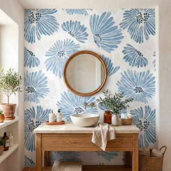 Linnea Blue Watercolor Floral Wallpaper in a bathroom with wood vanity, round mirror, and soft Nordic floral wall pattern