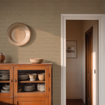 0446 Brown Faux Linen Wallpaper styled in an entryway with wood cabinet, pottery, doorway, warm sunlight, and neutral textured grasscloth look wall decor