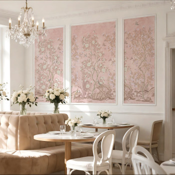 Pink chinoiserie floral wallpaper displayed as elegant decorative wall panels in a bright dining room with white table, chairs, and classic feminine decor.