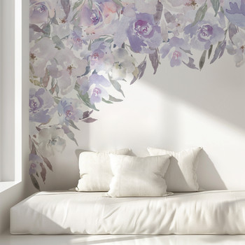 Lavender watercolor floral canopy wall decal cascading around a white daybed in a soft feminine bedroom