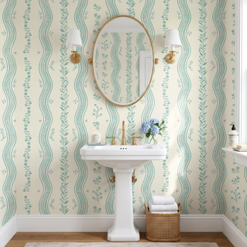 Elsie Ivory Mint Floral Stripe Wallpaper in Powder Room With Pedestal Sink and Round Mirror