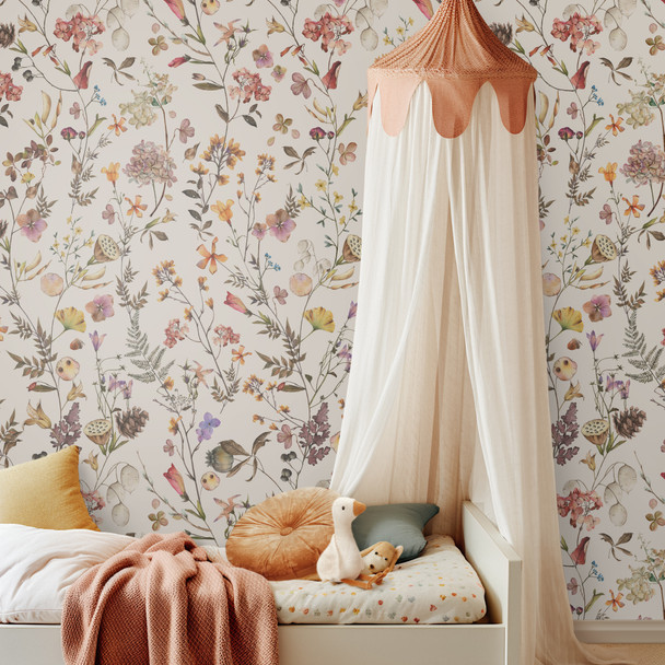 Beatrice Wildflower Wallpaper behind a nursery canopy bed in a romantic Cottagecore bedroom