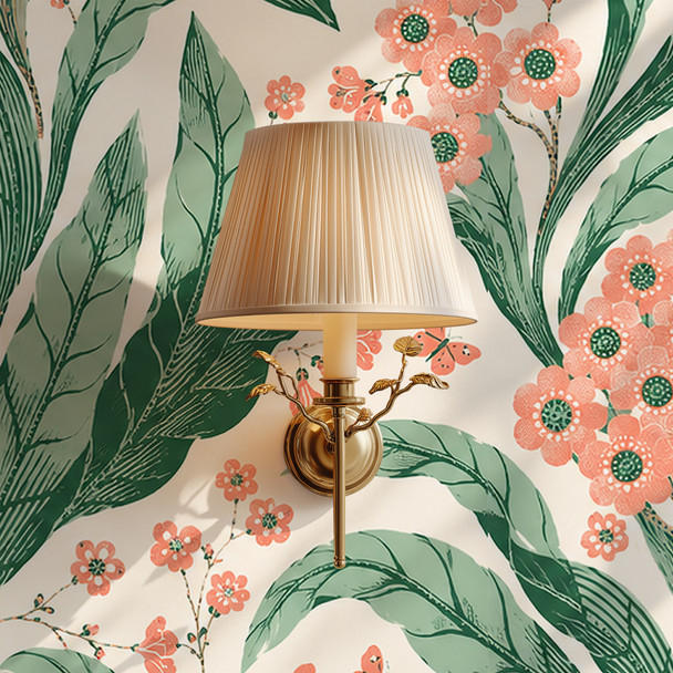 Botanical green floral wallpaper with coral flowers and brass sconce