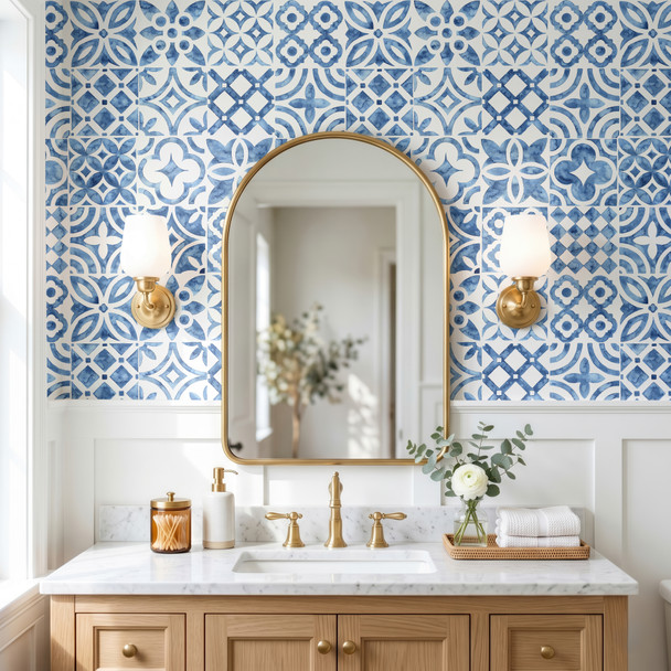 Blue Moroccan bathroom wallpaper behind wood vanity and arched mirror, 26-inch repeat