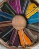 Lineup of waxed canvas colors made into bags including Bodacious Pink—premium 10 oz cotton canvas fabrics for bags, aprons, and outdoor gear.