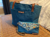 Handcrafted tote bag made from 10oz Light Blue waxed canvas—a soft, coastal pastel cotton duck with durable, water-repellent wax finish. Stylish and sturdy for everyday carry