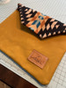 Lemon Curry waxed canvas dopp kit crafted from 10oz cotton duck. Eco-friendly, non-toxic wax coating resists moisture and develops a rich patina—ideal for rugged handmade accessories.
