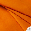 Drape of Marmalade orange Waxed Canvas Fabric (10 oz) — flexible, bold orange non-toxic waxed canvas