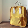 Small backpack made from  10oz cotton canvas, heavy-duty duck cloth with reinforced seams and preshrunk fabric