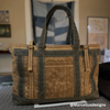 Weekender duffle bag made with Olive Drab waxed canvas – heritage style with structured shape and water resistance.