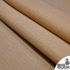 Folded yard of unbleached cotton waxed canvas – tear-resistant ripstop weave, matte water-repellent surface.