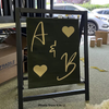 Sign crafted from 10oz black cotton canvas fabric