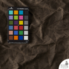 Canvas with color card placed on top — Olive Drab shade comparison