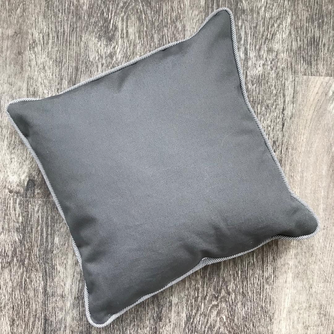 Decorative pillow in Charcoal Grey canvas — deep neutral tone perfect for modern and industrial home décor.