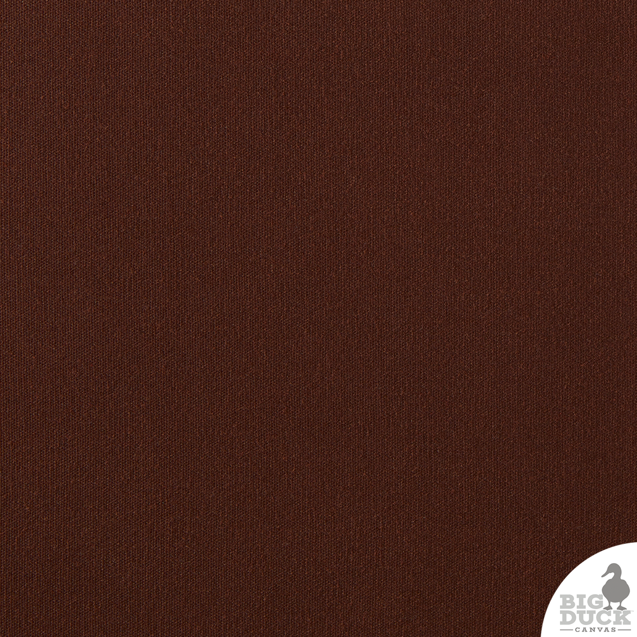 Close-up texture of Saddle Brown Waxed Cotton Canvas Fabric — 10 oz cotton duck weave coated in eco-friendly wax for water repellency