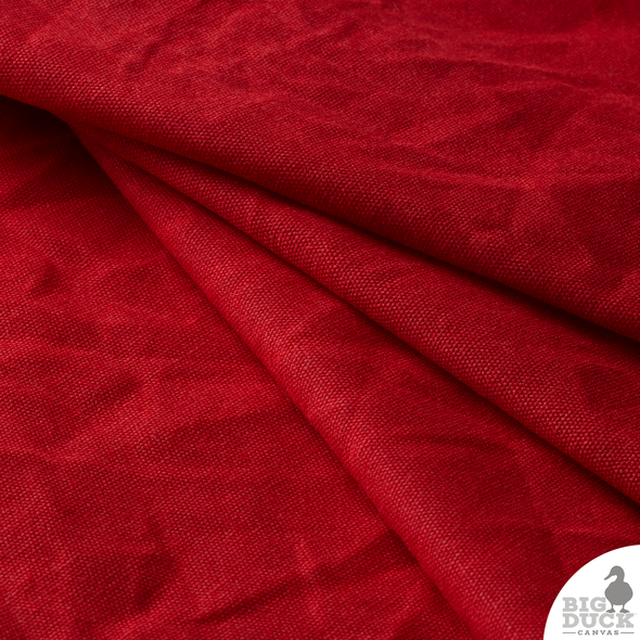10oz Red Waxed Canvas Fabric – rich, bold cotton duck with a durable, water-repellent wax finish. Perfect for bag making, aprons, and outdoor gear