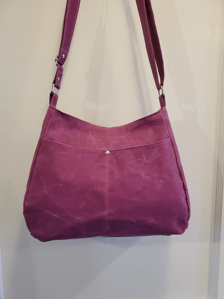 Handmade tote bag crafted from Bodacious Pink waxed canvas—rugged yet flexible 10oz cotton duck that develops a soft patina over time. Handmade tote bag crafted from Bodacious Pink waxed canvas—rugged yet flexible 10oz cotton duck that develops a soft patina over time.