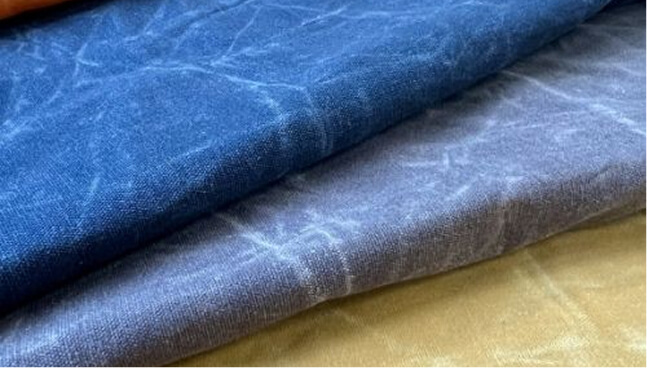 Blue waxed canvas folded