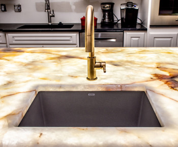 LED panel lights illuminating translucent stone around a sink LED panel lights illuminating translucent stone around a sink