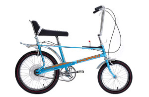 The Raleigh Chopper Space Blue heritage bicycle featuring iconic MK2 styling, high-rise handlebars, oversized saddle, and classic retro design.