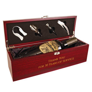 This is an elegant statement piece that will impress anyone. Our Wine Presentation Box with Tools has a beautiful Rosewood finish and black velvet interior. Personalize this with a company logo or recipient's name. (Unfortunately, wine is not included.) This is an elegant statement piece that will impress anyone. Our Wine Presentation Box with Tools has a beautiful Rosewood finish and black velvet interior. Personalize this with a company logo or recipient's name. (Unfortunately, wine is not included.)
