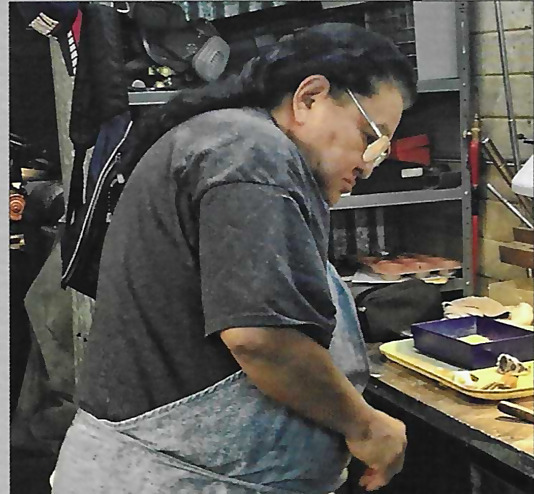 Roie Jaque at his silversmithing bench