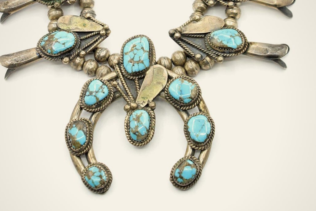Turquoise squash blossom necklaces
