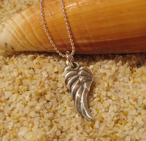 Angel Wing Charm handmade from reclaimed pure silver by U.S. artist Tracy Menz.