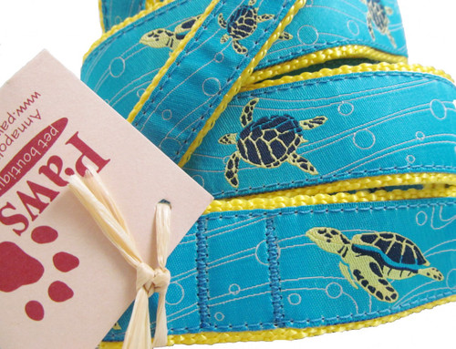 Sea Turtles are gliding through the blue watery ribbon on our turtle dog leashes.