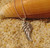 Angel Wing Charm handmade from reclaimed pure silver by U.S. artist Tracy Menz.