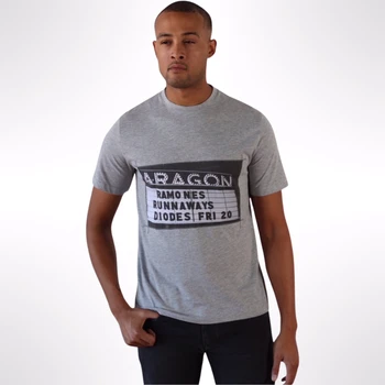 Man wearing grey graphic t-shirt.