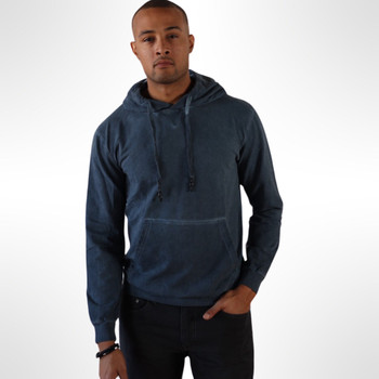Man wearing a blue hooded pullover sweatshirt.