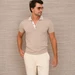 Man wearing a tan colored Pima cotton polo.