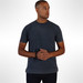 Man wearing a blue two-tone short sleeve cotton t-shirt.