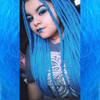 Dauminique wearing Turquoise braids