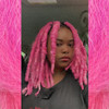 Celestine wearing faux locs made in Pink Ombré