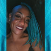 Malisha wearing braids in Blizzard Blue, Blue Raspberry, Bright Blue, and Tranquil Blue