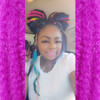 Roshonda wearing marley braid in Navy Blue, Neon Violet, and Neon Yellow