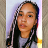 JaNine wearing braids in 1 Black and Pale Puce