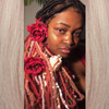 Shaymon wearing faux locs in Crimson, Dark Cherry Red, Dusty Rose, English Rose, Ice Pink, Peach Bloom, Rose, Rose Gold, and Vintage Pink