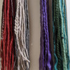 Synthetic dreads made by Brooke in Fern, Muted Purple, Ocean Green, Olive Grey, Rustic Red, Silver Blond, and Vintage Purple