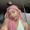 Kymea wearing braids in Dusty Rose and English Rose