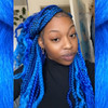 Chloe wearing braids in Cobalt Blue, Navy Blue, Sapphire Blue, and Turquoise