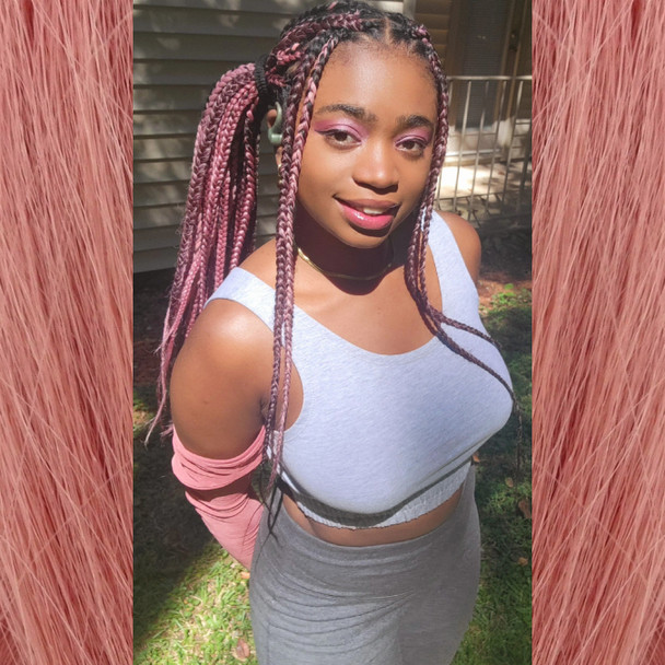 Aaniyah wearing braids in Dusty Rose, Rosewood, and Vintage Pink