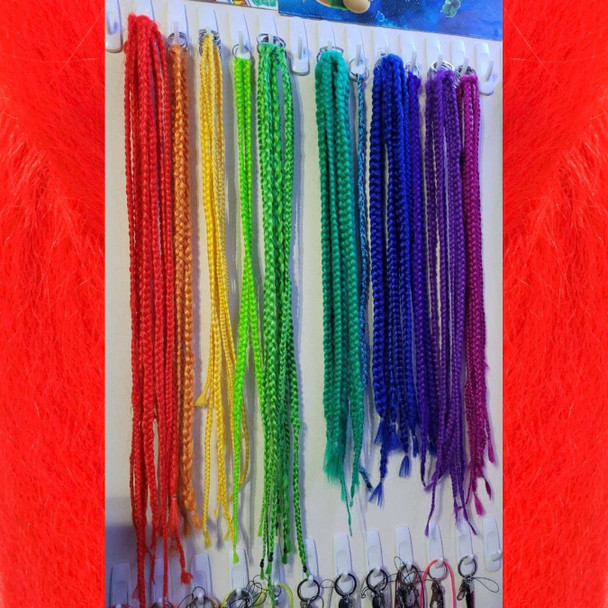 Braids made by Carlos in Red, Sherbet Orange, Yellow, Neon Lemon Lime, Emerald Green, Tranquil Blue, Navy Blue, Vibrant Purple, Purple, and Neon Violet