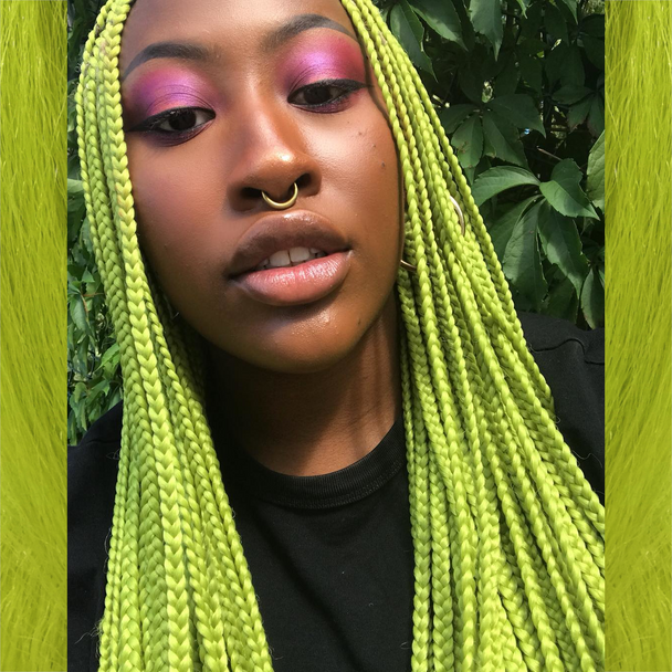 Christine wearing braids in Moss Green