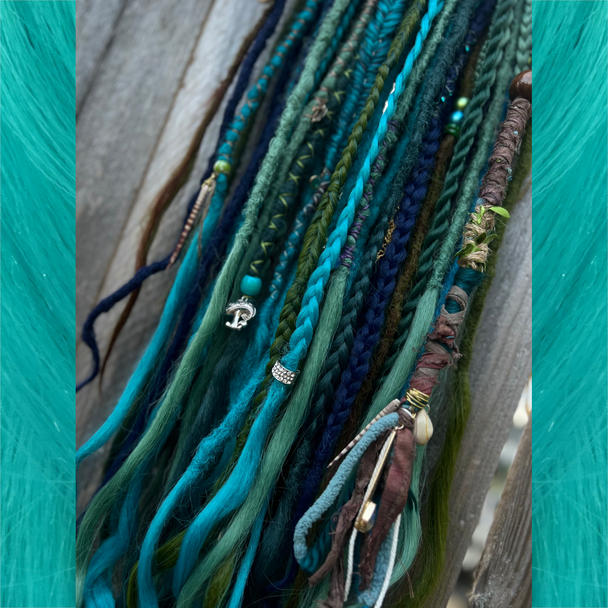 Synthetic dreads and braids made by Loveslavishlocks in Fern, Light Pine, Myrtle Green, Lagoon Blue, Night Sky, Olive Green, and Tropical Blue