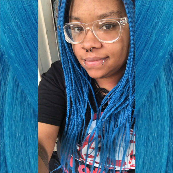 Sydni wearing braids in Blue Teal